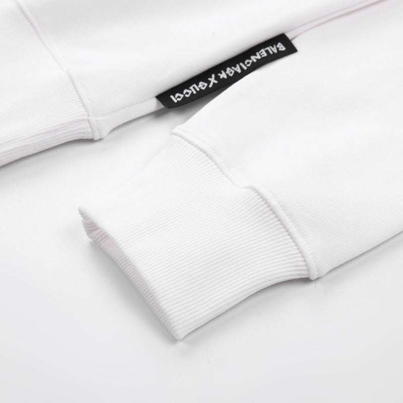 Front view of Gucci luxury clothing with signature branding