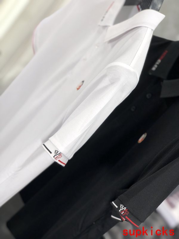 Front view of Moncler luxury clothing with tailored silhouette