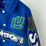 Close-up detail shot of Louis Vuitton luxury clothing with relaxed-fit cut