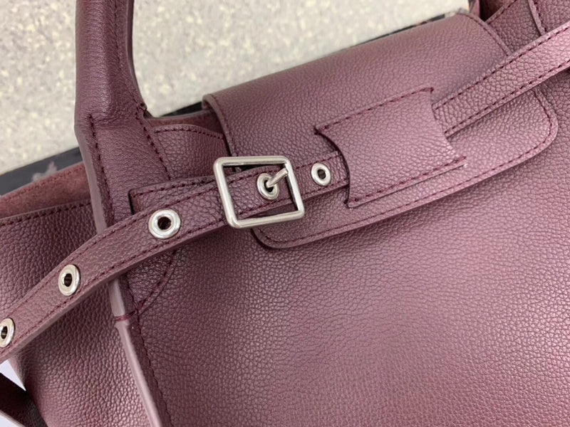 Handle and strap detail of signature statement women's handbag – women's premium purse