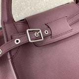 Handle and strap detail of signature statement women's handbag – women's premium purse