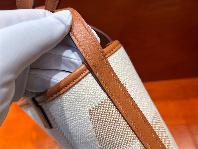Side view of polished structured handbag
