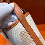 Side view of polished structured handbag