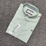 Back view of Lacoste luxury clothing with monogram-inspired silhouette