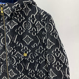 Flat lay presentation of Louis Vuitton luxury clothing with contemporary cut