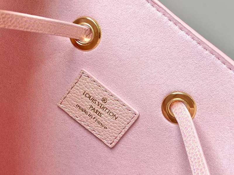 Side profile of signature premium women's handbag – women's statement bag
