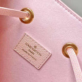 Side profile of signature premium women's handbag – women's statement bag