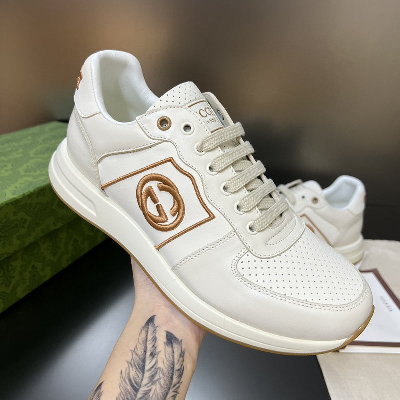 Gucci two-tone luxury sneakers view 4 signature lace-up style