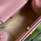 Side profile of premium classic women's handbag – women's statement bag