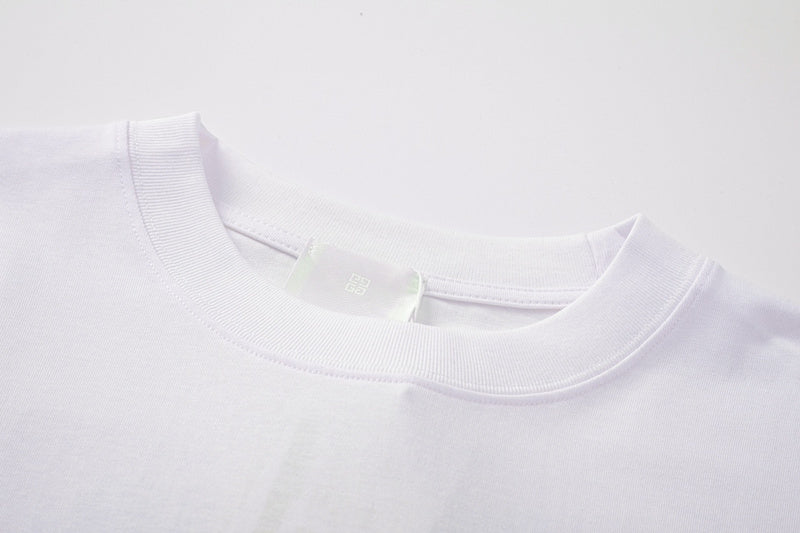 Close-up detail shot of Givenchy luxury clothing with signature branding