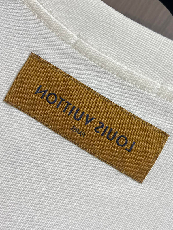 Close-up detail shot of Louis Vuitton cotton t-shirt with logo-detail design