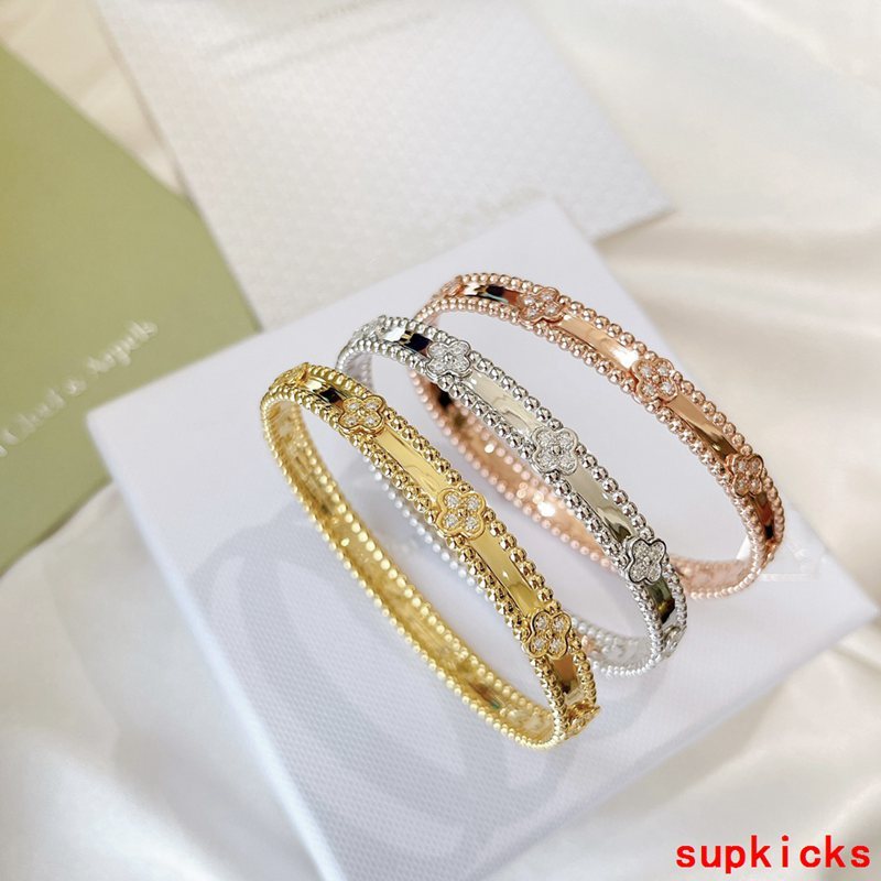 Side view of Van Cleef & Arpels unisex jewelry piece