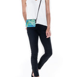 Ziva's Charm clutch bag – close-up view (one versatile size)