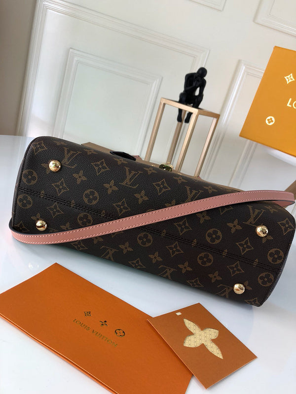 Styled lifestyle shot of chic signature women's handbag – women's luxury handbag
