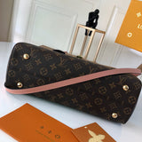 Styled lifestyle shot of chic signature women's handbag – women's luxury handbag