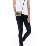 Ziva's Charm clutch bag – close-up view (one versatile size)