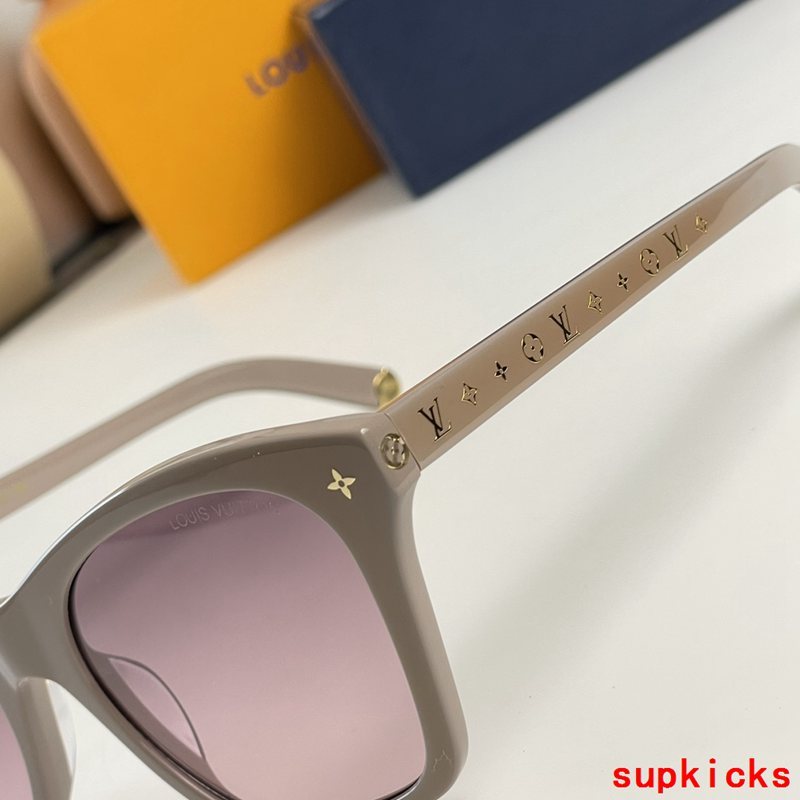 Close-up detail view of Louis Vuitton unisex sunglasses