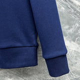 Back view of Louis Vuitton luxury clothing with tailored silhouette