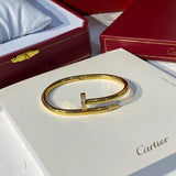 Close-up detail view of Cartier unisex jewelry piece