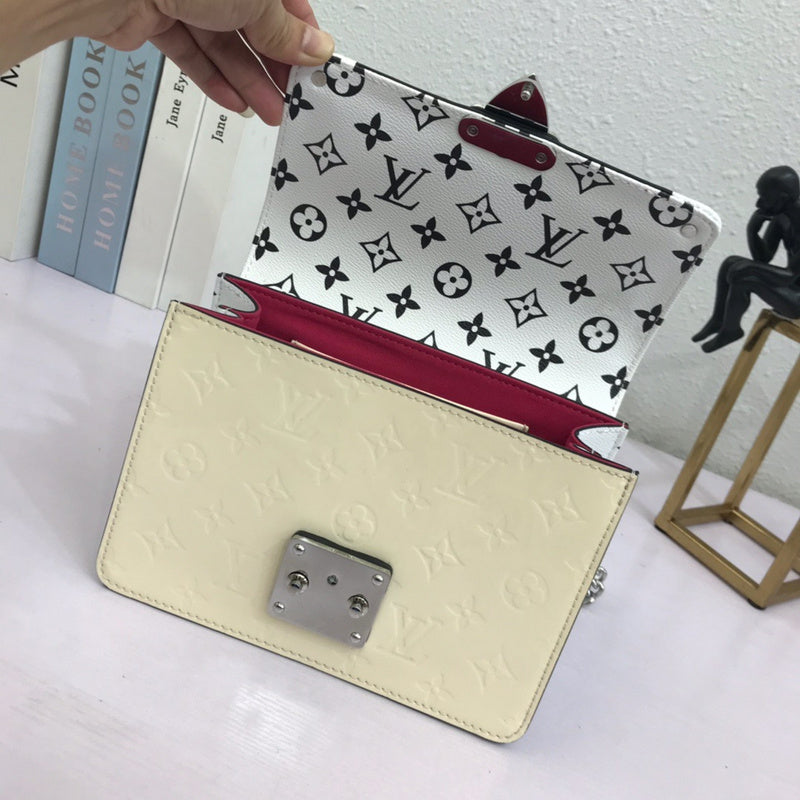 Top view of refined signature women's handbag – women's luxury handbag