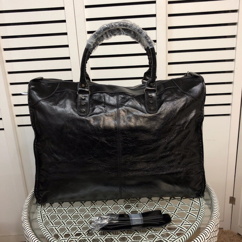 Top view of polished elevated women's handbag – women's statement bag