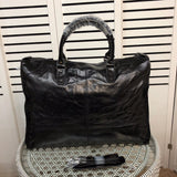 Top view of polished elevated women's handbag – women's statement bag