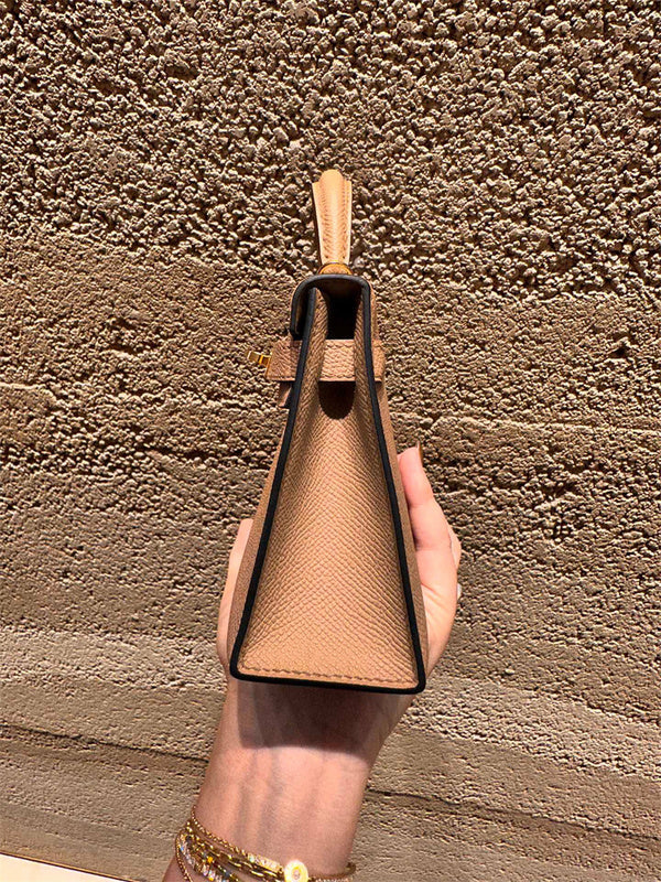 Side view of tailored structured handbag