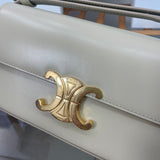 Front view of classic refined women's handbag – women's luxury accessory
