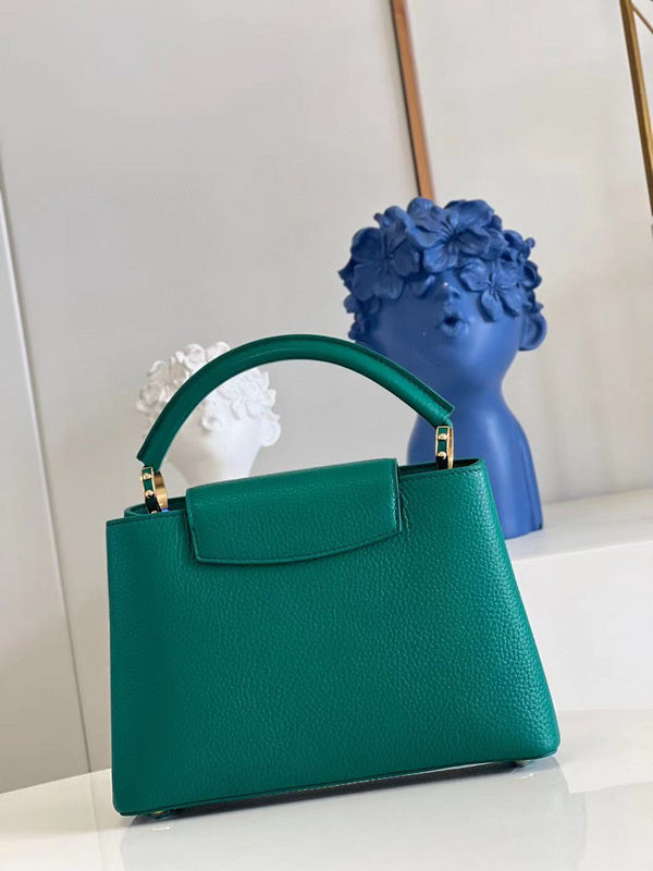 Handle and strap detail of signature chic women's handbag – women's designer-style accessory