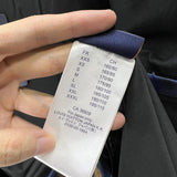Close-up detail shot of Louis Vuitton luxury clothing with runway-inspired design