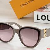 Close-up detail view of Louis Vuitton unisex sunglasses