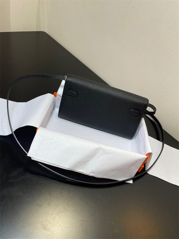 Streamlined carryall bag carried on shoulder 10