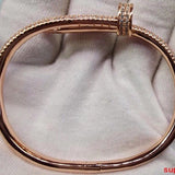 Side view of Cartier unisex jewelry piece