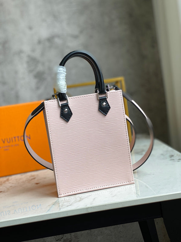 Back view of structured elevated women's handbag – women's statement bag