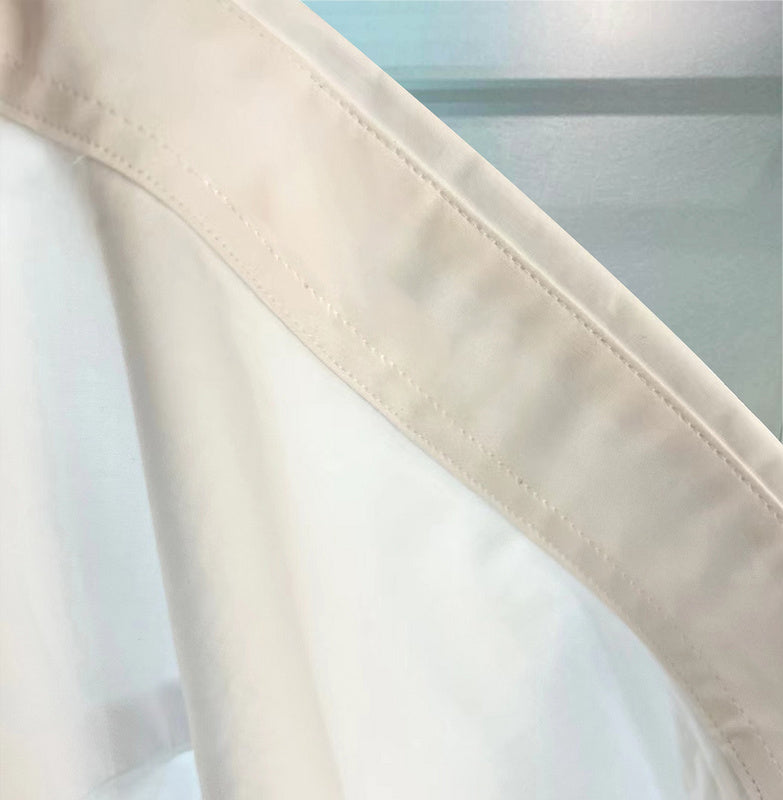 Side profile of Louis Vuitton luxury clothing with tailored silhouette