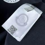 Side profile of Moncler luxury clothing with signature branding
