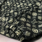Full styled look of Louis Vuitton luxury clothing with signature branding