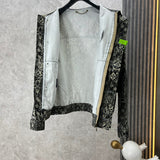 Side profile of Louis Vuitton luxury clothing with runway-inspired design