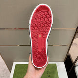 Side profile of Gucci two-tone sneakers streetwear statement look