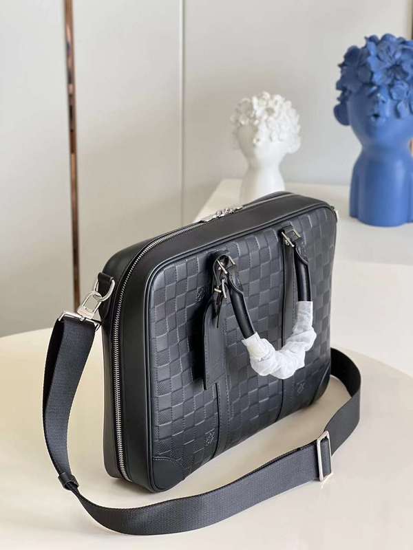 Handle and strap detail of modern elevated women's handbag – women's luxury handbag