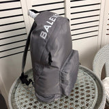 Front view of polished statement women's handbag – women's statement bag