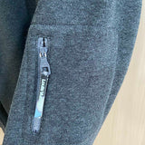Back view of Louis Vuitton luxury clothing with label-forward styling