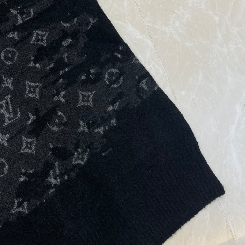 Flat lay presentation of Louis Vuitton luxury clothing with streetwear-inspired cut