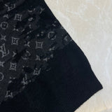 Flat lay presentation of Louis Vuitton luxury clothing with streetwear-inspired cut
