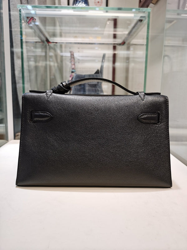 Side view of sculpted structured handbag