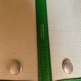  Structured top-handle bag carried on shoulder