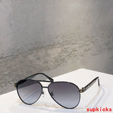 Close-up detail view of Louis Vuitton unisex sunglasses