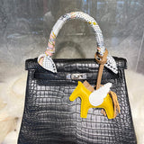 Side view of contemporary structured handbag