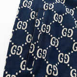 Front view of Gucci luxury clothing with logo-detail design