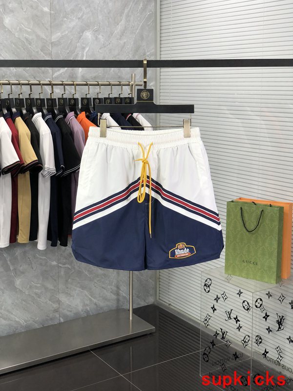 Side profile of Rhude luxury clothing with label-forward styling